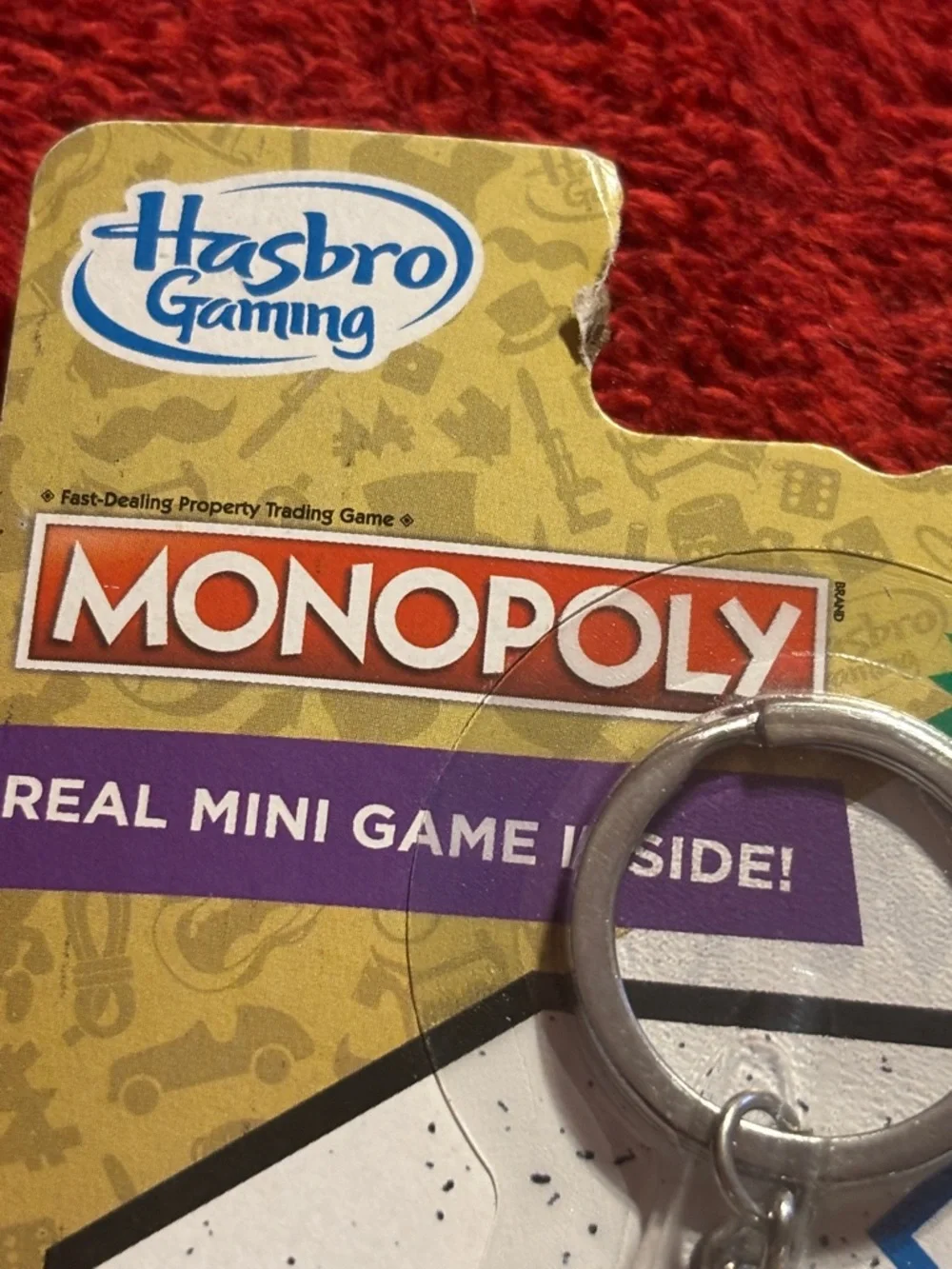Hasbro Monopoly Mini Keychain Game - Gold and Clear. New